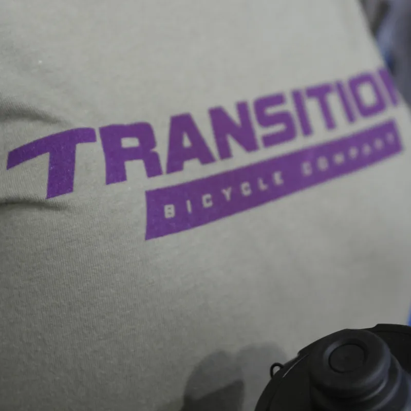 Transition TBC Womans T-Shirt Standard Logo Olive and Purple-1
